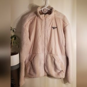 BRAND NEW W/ TAGS. REEBOK SIZE SMALL JACKET.